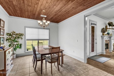 This 4 bedroom, 2 bath home is full of charm and space for the on Lake Caroline Golf Club in Mississippi - for sale on GolfHomes.com, golf home, golf lot