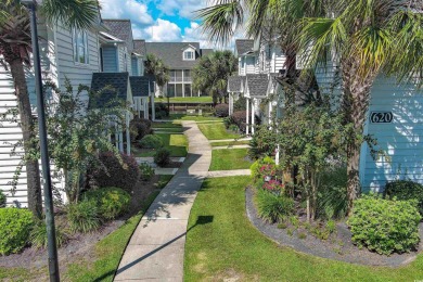 Interior designer's paradise! This spacious 2-story, 2-bedroom on International Club of Myrtle Beach in South Carolina - for sale on GolfHomes.com, golf home, golf lot