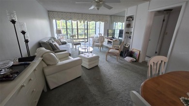 Welcome to this charming  condo located on the third floor in on Carrollwood Country Club in Florida - for sale on GolfHomes.com, golf home, golf lot