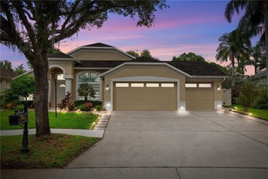 Discover timeless elegance in this stunning, oversized on Westchase Golf Club in Florida - for sale on GolfHomes.com, golf home, golf lot