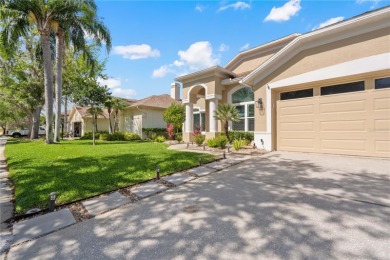 Discover timeless elegance in this stunning, oversized on Westchase Golf Club in Florida - for sale on GolfHomes.com, golf home, golf lot