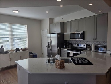 Beautiful lake & golf course VIEW is included with this SOCIAL on Legends Golf and Country Club in Florida - for sale on GolfHomes.com, golf home, golf lot