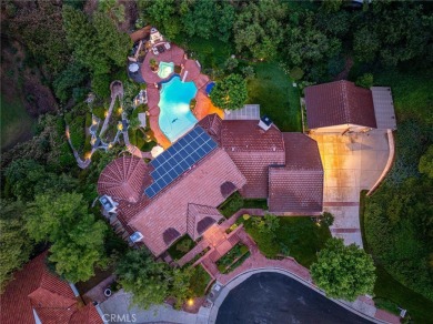 Welcome to this exceptional estate in the heart of Valencia--an on Vista Valencia Golf Course in California - for sale on GolfHomes.com, golf home, golf lot