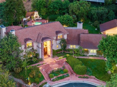 Welcome to this exceptional estate in the heart of Valencia--an on Vista Valencia Golf Course in California - for sale on GolfHomes.com, golf home, golf lot