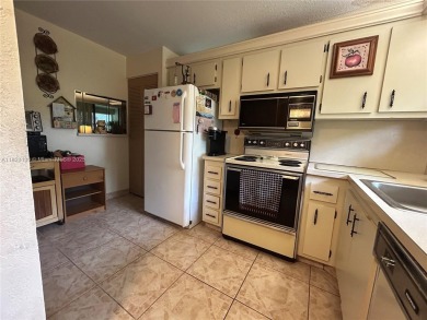 PRICED TO SELL IN SOUGHT AFTER 55+ SUNRISE LAKES PHASE IV. FIRST on Sunrise Lakes Phase IV Golf Course in Florida - for sale on GolfHomes.com, golf home, golf lot