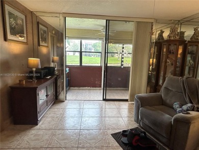 PRICED TO SELL IN SOUGHT AFTER 55+ SUNRISE LAKES PHASE IV. FIRST on Sunrise Lakes Phase IV Golf Course in Florida - for sale on GolfHomes.com, golf home, golf lot