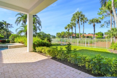 Nestled on nearly a half acre estate lot with picturesque sunset on Breakers Rees Jones Course in Florida - for sale on GolfHomes.com, golf home, golf lot