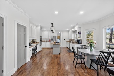 Discover timeless elegance and golf course living in this on Woodside Plantation Country Club in South Carolina - for sale on GolfHomes.com, golf home, golf lot