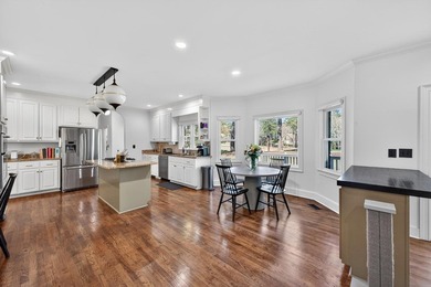 Discover timeless elegance and golf course living in this on Woodside Plantation Country Club in South Carolina - for sale on GolfHomes.com, golf home, golf lot