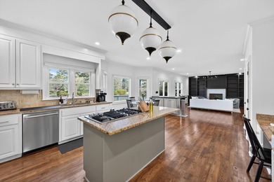 Discover timeless elegance and golf course living in this on Woodside Plantation Country Club in South Carolina - for sale on GolfHomes.com, golf home, golf lot