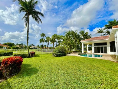 Nestled on nearly a half acre estate lot with picturesque sunset on Breakers Rees Jones Course in Florida - for sale on GolfHomes.com, golf home, golf lot