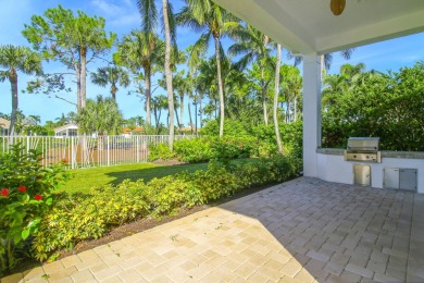 Nestled on nearly a half acre estate lot with picturesque sunset on Breakers Rees Jones Course in Florida - for sale on GolfHomes.com, golf home, golf lot