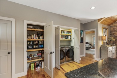 Presenting a move-in-ready, impeccably maintained on Sapphire National Golf Club in North Carolina - for sale on GolfHomes.com, golf home, golf lot