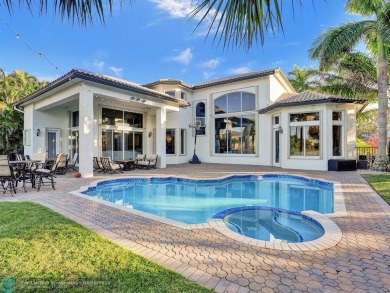 Welcome to this luxurious 5-bedroom, 5-bathroom home in the on Heron Bay Golf Club in Florida - for sale on GolfHomes.com, golf home, golf lot