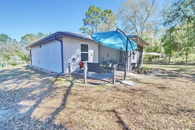 Stunning Custom-Built in Citrus Springs. This beautiful on Citrus Springs Country Club in Florida - for sale on GolfHomes.com, golf home, golf lot