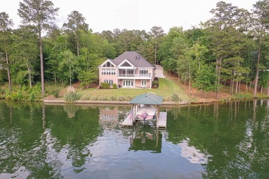 Live the lake life on Lake Greenwood! This stately home is on The Links At Stoney Point in South Carolina - for sale on GolfHomes.com, golf home, golf lot