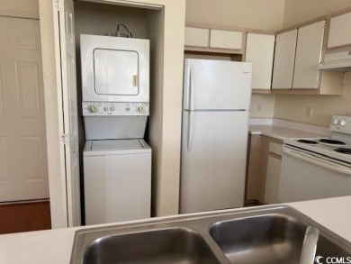 WELCOME TO THIS CHARMING, CONVENIENTLY LOCATED CONDO IN FAIRWAYS on World Tour Golf Links in South Carolina - for sale on GolfHomes.com, golf home, golf lot