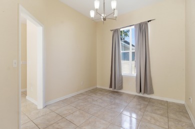 Welcome to this beautifully maintained 3-bedroom, 2-bathroom on Wildwood Country Club in Florida - for sale on GolfHomes.com, golf home, golf lot