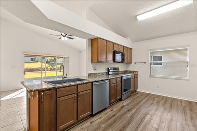 Live the golf course lifestyle in the highly sought-after Kings on Kings Ridge Golf Club in Florida - for sale on GolfHomes.com, golf home, golf lot