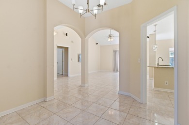 Welcome to this beautifully maintained 3-bedroom, 2-bathroom on Wildwood Country Club in Florida - for sale on GolfHomes.com, golf home, golf lot