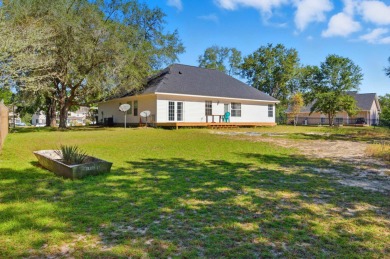 Welcome to this beautifully maintained 3-bedroom, 2-bathroom on Wildwood Country Club in Florida - for sale on GolfHomes.com, golf home, golf lot