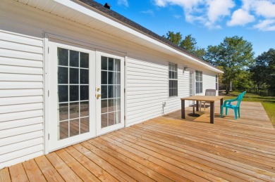 Welcome to this beautifully maintained 3-bedroom, 2-bathroom on Wildwood Country Club in Florida - for sale on GolfHomes.com, golf home, golf lot