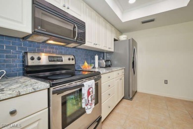 You are just steps to the inviting community pool from this on Fiddlesticks Country Club in Florida - for sale on GolfHomes.com, golf home, golf lot