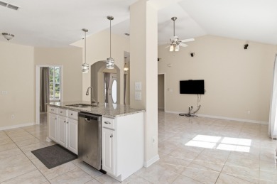 Welcome to this beautifully maintained 3-bedroom, 2-bathroom on Wildwood Country Club in Florida - for sale on GolfHomes.com, golf home, golf lot