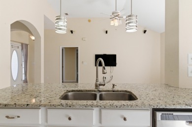 Welcome to this beautifully maintained 3-bedroom, 2-bathroom on Wildwood Country Club in Florida - for sale on GolfHomes.com, golf home, golf lot