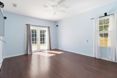 Welcome to this beautifully maintained 3-bedroom, 2-bathroom on Wildwood Country Club in Florida - for sale on GolfHomes.com, golf home, golf lot