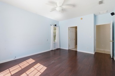 Welcome to this beautifully maintained 3-bedroom, 2-bathroom on Wildwood Country Club in Florida - for sale on GolfHomes.com, golf home, golf lot