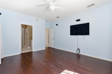 Welcome to this beautifully maintained 3-bedroom, 2-bathroom on Wildwood Country Club in Florida - for sale on GolfHomes.com, golf home, golf lot