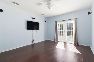 Welcome to this beautifully maintained 3-bedroom, 2-bathroom on Wildwood Country Club in Florida - for sale on GolfHomes.com, golf home, golf lot