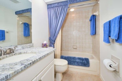 You are just steps to the inviting community pool from this on Fiddlesticks Country Club in Florida - for sale on GolfHomes.com, golf home, golf lot