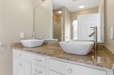 Welcome to this beautifully maintained 3-bedroom, 2-bathroom on Wildwood Country Club in Florida - for sale on GolfHomes.com, golf home, golf lot