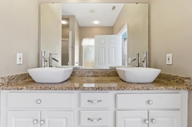 Welcome to this beautifully maintained 3-bedroom, 2-bathroom on Wildwood Country Club in Florida - for sale on GolfHomes.com, golf home, golf lot