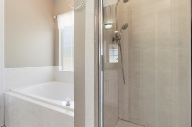 Welcome to this beautifully maintained 3-bedroom, 2-bathroom on Wildwood Country Club in Florida - for sale on GolfHomes.com, golf home, golf lot
