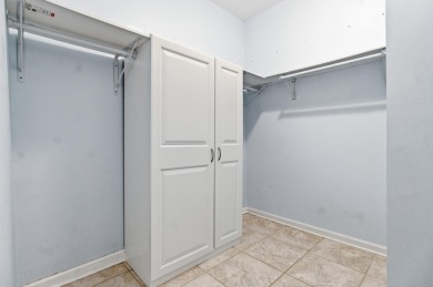 Welcome to this beautifully maintained 3-bedroom, 2-bathroom on Wildwood Country Club in Florida - for sale on GolfHomes.com, golf home, golf lot
