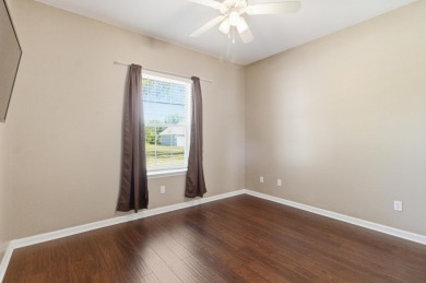 Welcome to this beautifully maintained 3-bedroom, 2-bathroom on Wildwood Country Club in Florida - for sale on GolfHomes.com, golf home, golf lot