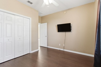 Welcome to this beautifully maintained 3-bedroom, 2-bathroom on Wildwood Country Club in Florida - for sale on GolfHomes.com, golf home, golf lot
