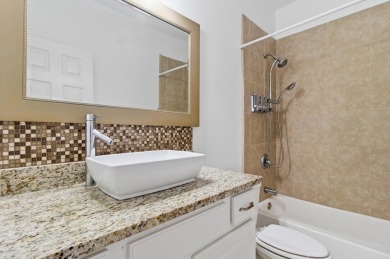 Welcome to this beautifully maintained 3-bedroom, 2-bathroom on Wildwood Country Club in Florida - for sale on GolfHomes.com, golf home, golf lot