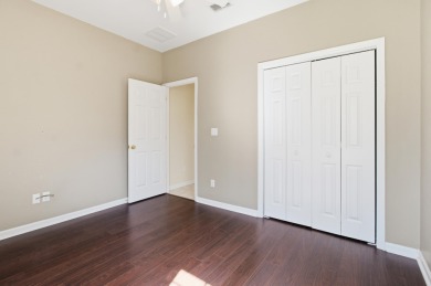 Welcome to this beautifully maintained 3-bedroom, 2-bathroom on Wildwood Country Club in Florida - for sale on GolfHomes.com, golf home, golf lot