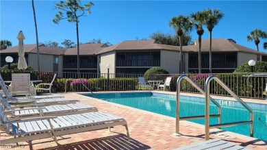 You are just steps to the inviting community pool from this on Fiddlesticks Country Club in Florida - for sale on GolfHomes.com, golf home, golf lot