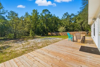 Welcome to this beautifully maintained 3-bedroom, 2-bathroom on Wildwood Country Club in Florida - for sale on GolfHomes.com, golf home, golf lot