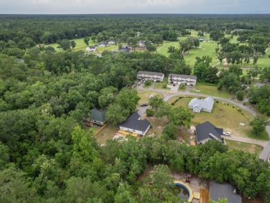 Welcome to this beautifully maintained 3-bedroom, 2-bathroom on Wildwood Country Club in Florida - for sale on GolfHomes.com, golf home, golf lot
