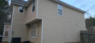 Welcome home to this beautiful 4 bedroom, 3 and 1/2 bath home in on  in Georgia - for sale on GolfHomes.com, golf home, golf lot