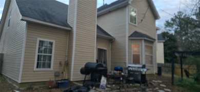 Welcome home to this beautiful 4 bedroom, 3 and 1/2 bath home in on  in Georgia - for sale on GolfHomes.com, golf home, golf lot