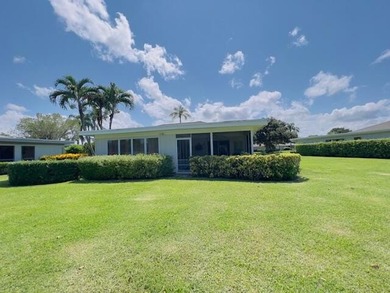 2 bedroom, 2.5 baths, overlooking golf course, tile floors on  in Florida - for sale on GolfHomes.com, golf home, golf lot