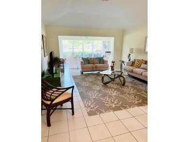 2 bedroom, 2.5 baths, overlooking golf course, tile floors on  in Florida - for sale on GolfHomes.com, golf home, golf lot