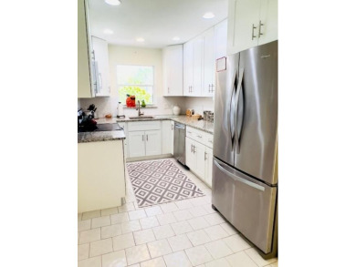2 bedroom, 2.5 baths, overlooking golf course, tile floors on Eastpointe Country Club in Florida - for sale on GolfHomes.com, golf home, golf lot